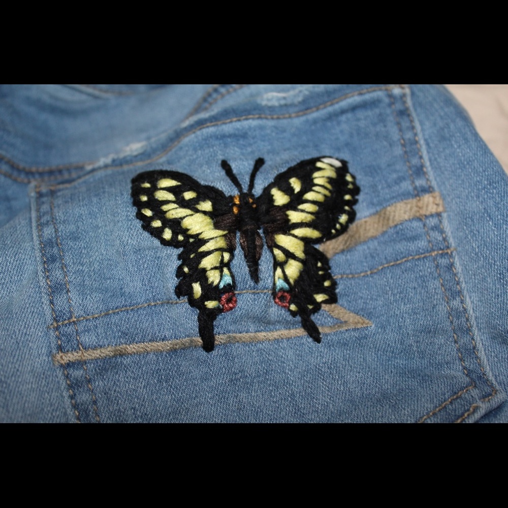 Hand embroidered butterfly denim shorts